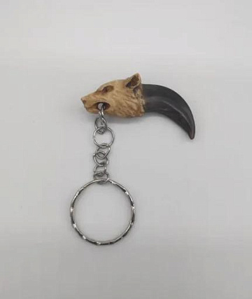 Коготь волка с головой из рога лося Фото Коготь волка с головой из рога лося