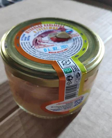 Щупальца кальмара и гребешок Фото Щупальца кальмара и гребешок